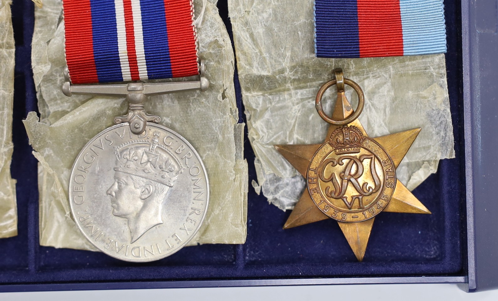 A WWII group of 5 including war medal with oak leaf and 1939-45 star with oak leaf to L.E. TYLER, 8th Army bar (with named box)